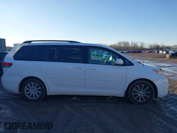 2012 Toyota Sienna XLE with VIN 5TDDK3DC4CS042464, listed as a IAAI auction lot 41199300 with 143,677 mi miles. Bid and sale history available at carsss.com. Image 13.