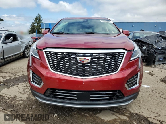 2023 Cadillac XT5 FWD Premium Luxury z VIN 1GYKNCRS5PZ173528, wystawiony jako Copart lot #55805605 z przebiegiem 7 789 mil mil oraz Szkoda całkowita • Salvage title. Historia ofert i sprzedaży dostępna na DreamBid. Obrazek 5.