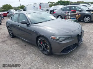 2023 Alfa Romeo Giulia Veloce with VIN ZARFAMBN6P7666665, listed as a IAAI auction lot 42014346 with 14,159 mi miles. Bid and sale history available at carsss.com. Image 1.