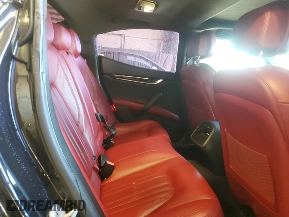 2017 Maserati Ghibli S Q4 z VIN ZAM57RTAXH1221570, wystawiony jako Copart lot #56003065 z przebiegiem 96 414 mil mil oraz Szkody całkowita. Historia ofert i sprzedaży dostępna na DreamBid. Obrazek 10.