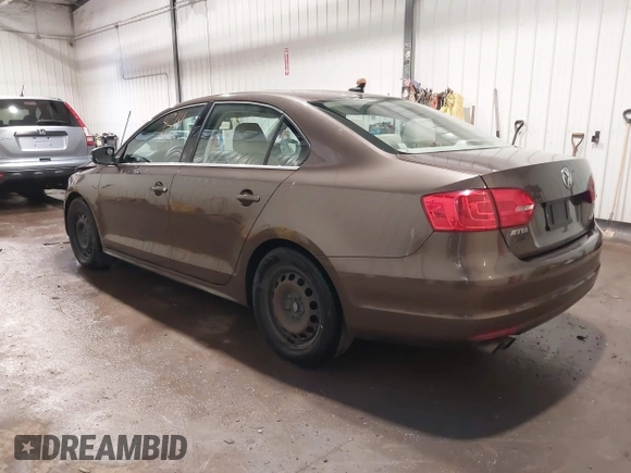 2014 Volkswagen Jetta TDI w/Premium with VIN 3VWLL7AJ1EM358214, listed as a IAAI auction lot 42148435 with 174,923 mi miles and . Bid and sale history available at DreamBid. Image 3.