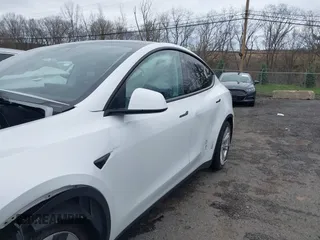 2023 Tesla Model Y Long Range with VIN 7SAYGDEEXPF684287, listed as a IAAI auction lot 41961230 with 45,080 mi miles and . Bid and sale history available at carsss.com. Image 19.