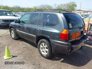 2006 GMC Envoy SLT with VIN 1GKDS13SX62247347, listed as a IAAI auction lot 42031142 with 263,599 mi miles. Bid and sale history available at carsss.com. Image 3.