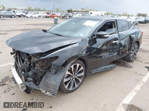2016 Nissan Maxima SV z VIN 1N4AA6AP8GC408857, wystawiony jako IAAI lot #41892425 z przebiegiem 185 487 mil mil oraz . Historia ofert i sprzedaży dostępna na DreamBid. Obrazek 18.