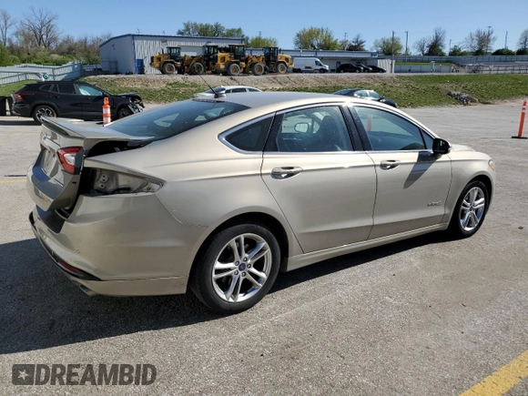 2016 Ford Fusion Titanium Hybrid with VIN 3FA6P0RU0GR153294, listed as a Copart auction lot 52723515 with 117,570 mi miles and Salvage title. Bid and sale history available at DreamBid. Image 3.
