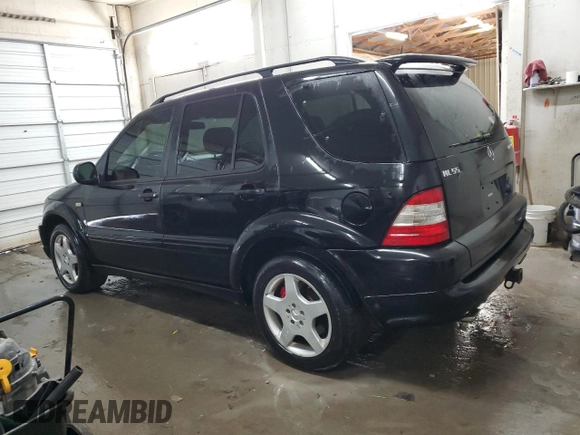2000 Mercedes-Benz M-Class AMG with VIN 4JGAB74EXYA219143, listed as a Copart auction lot 71922634 with 156,092 mi miles and Salvage Title. Bid and sale history available at carsss.com. Image 2.