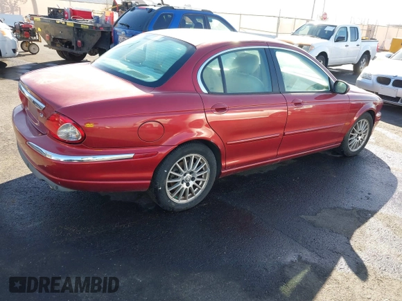2008 Jaguar X-Type with VIN SAJWA51A98WJ28713, listed as a IAAI auction lot 41518334 with 123,748 mi miles and . Bid and sale history available at DreamBid. Image 4.