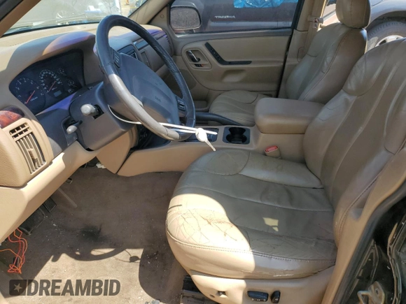 2000 Jeep Grand Cherokee Laredo z VIN 1J4GW48N0YC210235, wystawiony jako Copart lot #60558905 z przebiegiem 131 108 mil mil oraz Szkoda całkowita • Salvage title. Historia ofert i sprzedaży dostępna na DreamBid. Obrazek 7.