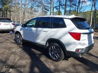2023 Honda Passport EX-L z VIN 5FNYF8H56PB037470, wystawiony jako IAAI lot #41330084 z przebiegiem Nie podano mil oraz . Historia ofert i sprzedaży dostępna na DreamBid. Obrazek 3.