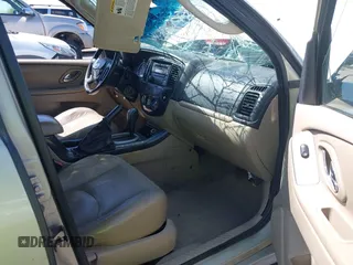 2005 Mazda Tribute i with VIN 4F2YZ02Z75KM56108, listed as a IAAI auction lot 42022864 with Not Provided miles and . Bid and sale history available at carsss.com. Image 5.