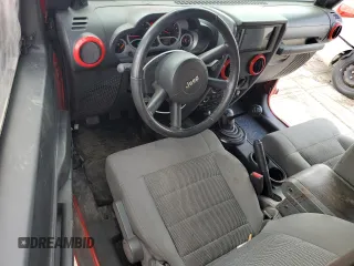 2009 Jeep Wrangler Rubicon with VIN 1J4GA64129L708452, listed as a Copart auction lot 62280484 with 103,714 mi miles and Clean Title. Bid and sale history available at DreamBid. Image 8.
