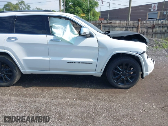 2017 Jeep Grand Cherokee Overland with VIN 1C4RJFCT6HC880306, listed as a IAAI auction lot 42534987 with 97,976 mi miles and . Bid and sale history available at DreamBid. Image 13.
