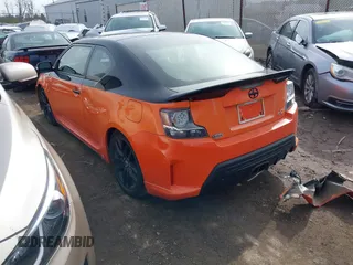 2015 Scion tC with VIN JTKJF5C7XFJ008076, listed as a IAAI auction lot 40856462 with 155,117 mi miles. Bid and sale history available at carsss.com. Image 3.