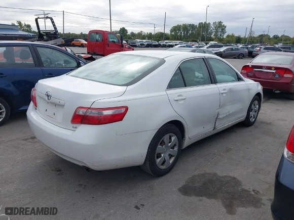2007 Toyota Camry CE with VIN 4T1BE46K57U727322, listed as a IAAI auction lot 37779366 with 130,795 mi miles. Bid and sale history available at carsss.com. Image 4.