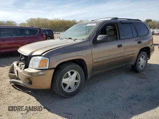 2003 GMC Envoy SLT z VIN 1GKDS13S032134647, wystawiony jako Copart lot #50137325 z przebiegiem 217 878 mil mil oraz Szkody całkowita. Historia ofert i sprzedaży dostępna na DreamBid. Obrazek 1.
