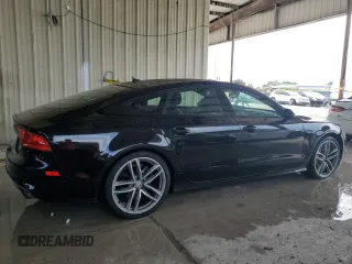2015 Audi A7 3.0 Prestige with VIN WAU2GAFCXFN011804, listed as a Copart auction lot 67521504 with 129,734 mi miles and Salvage Title. Bid and sale history available at carsss.com. Image 3.