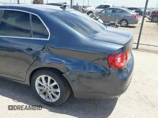 2010 Volkswagen Jetta Limited Edition with VIN 3VWRX7AJ1AM067933, listed as a IAAI auction lot 42153235 with 127,051 mi miles and . Bid and sale history available at DreamBid. Image 6.