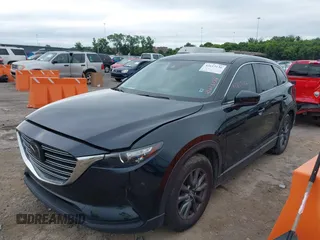 2021 Mazda CX-9 Sport with VIN JM3TCABY6M0522352, listed as a IAAI auction lot 42613136 with 106,167 mi miles and . Bid and sale history available at DreamBid. Image 14.