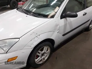 2002 Ford Focus ZX3 с VIN 3FAFP31342R171472, выставлен на аукционе IAAI как лот 41916406 с пробегом 334 934 миль миль и . История ставок и продаж доступна на DreamBid. Изображение 6.