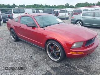 2007 Ford Mustang Deluxe with VIN 1ZVFT80N675358791, listed as a IAAI auction lot 42757449 with 152,974 mi miles and . Bid and sale history available at DreamBid. Image 1.