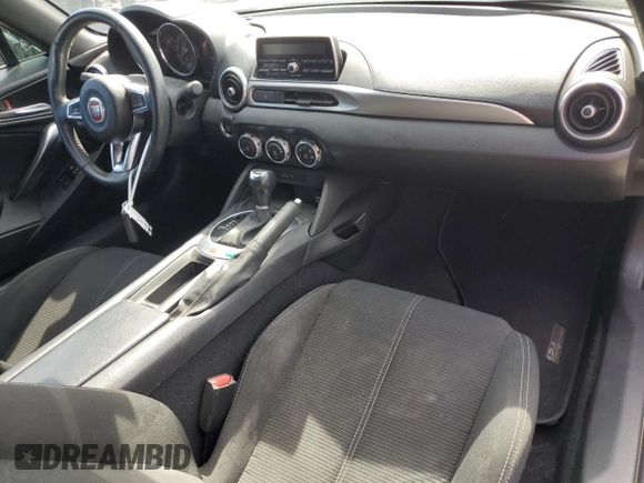 2017 FIAT 124 Spider Elaborazione Abarth z VIN JC1NFAEK6H0124254, wystawiony jako Copart lot #46738325 z przebiegiem 24 427 mil mil oraz Czysty tytuł • Clean title. Historia ofert i sprzedaży dostępna na DreamBid. Obrazek 8.