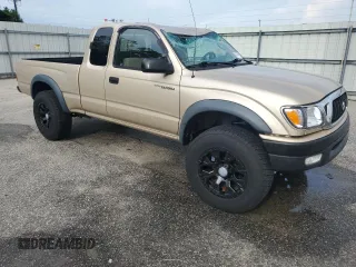 2002 Toyota Tacoma with VIN 5TEWM72N12Z093226, listed as a Copart auction lot 61019955 with 103,657 mi miles and Clean title. Bid and sale history available at DreamBid. Image 4.
