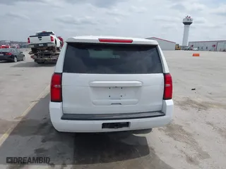 2020 Chevrolet Tahoe Commercial with VIN 1GNSKDEC9LR260983, listed as a IAAI auction lot 42062097 with 124,911 mi miles. Bid and sale history available at carsss.com. Image 16.