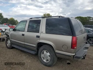 1999 GMC Yukon with VIN 1GKEK13R9XJ787877, listed as a Copart auction lot 72185044 with 191,710 mi miles and Salvage Title. Bid and sale history available at carsss.com. Image 2.