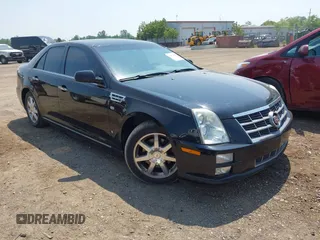 2008 Cadillac STS AWD z VIN 1G6DA67V880130688, wystawiony jako IAAI lot #42473199 z przebiegiem 189 927 mil mil oraz . Historia ofert i sprzedaży dostępna na DreamBid. Obrazek 1.