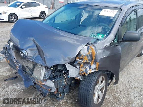 2014 Toyota Sienna L with VIN 5TDZK3DC4ES407928, listed as a IAAI auction lot 41887349 with 208,289 mi miles. Bid and sale history available at carsss.com. Image 6.