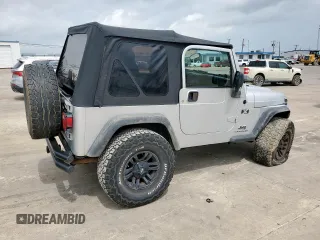 2004 Jeep Wrangler X z VIN 1J4FA39S34P702186, wystawiony jako Copart lot #59561675 z przebiegiem 202 214 mil mil oraz Szkoda całkowita • Salvage title. Historia ofert i sprzedaży dostępna na DreamBid. Obrazek 3.