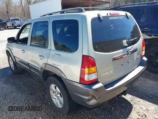 2004 Mazda Tribute LX with VIN 4F2YZ041X4KM23352, listed as a IAAI auction lot 41605357 with 276,243 mi miles and . Bid and sale history available at DreamBid. Image 3.