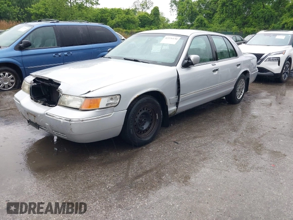 2001 Mercury Grand Marquis GS z VIN 2MEFM74W91X618246, wystawiony jako IAAI lot #42226130 z przebiegiem 125 487 mil mil oraz . Historia ofert i sprzedaży dostępna na DreamBid. Obrazek 2.