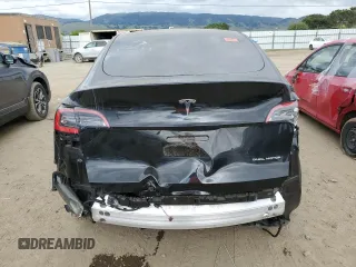 2021 Tesla Model Y Long Range z VIN 5YJYGDEE7MF093942, wystawiony jako Copart lot #54762425 z przebiegiem 20 492 mil mil oraz Szkoda całkowita • Salvage title. Historia ofert i sprzedaży dostępna na DreamBid. Obrazek 6.