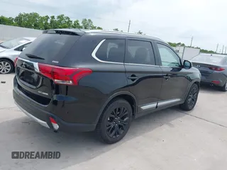 2016 Mitsubishi Outlander GT with VIN JA4JZ4AX3GZ049349, listed as a IAAI auction lot 42476820 with 92,098 mi miles and . Bid and sale history available at DreamBid. Image 4.