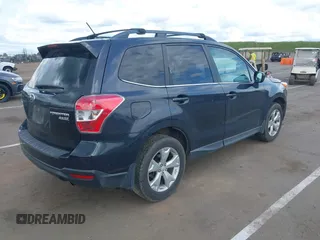 2014 Subaru Forester 2.5i Limited with VIN JF2SJAHC9EH448029, listed as a IAAI auction lot 41919935 with 153,728 mi miles. Bid and sale history available at carsss.com. Image 4.
