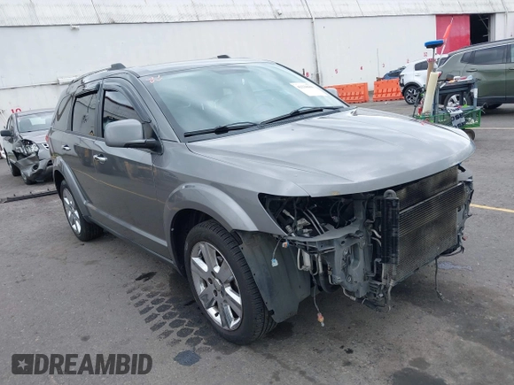 2012 Dodge Journey Crew with VIN 3C4PDDDG4CT213848, listed as a IAAI auction lot 42228688 with 143,406 mi miles and . Bid and sale history available at DreamBid. Image 1.
