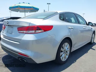 2018 Kia Optima LX with VIN 5XXGT4L35JG266892, listed as a IAAI auction lot 42473938 with 79,690 mi miles and . Bid and sale history available at DreamBid. Image 4.