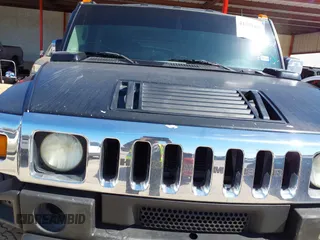 2004 Hummer H2 with VIN 5GRGN23U64H101592, listed as a IAAI auction lot 41379405 with 174,672 mi miles. Bid and sale history available at carsss.com. Image 6.