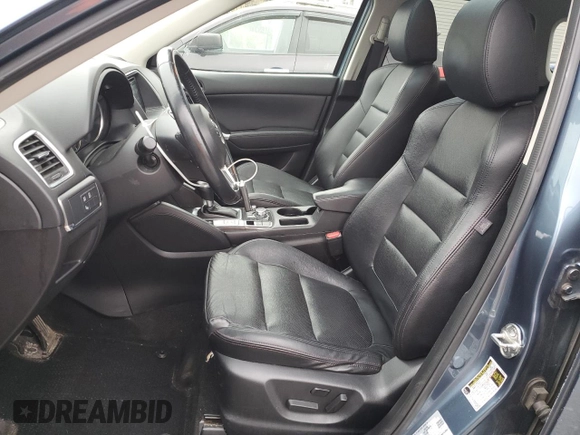 2016 Mazda CX-5 Grand Touring with VIN JM3KE4DY7G0761594, listed as a Copart auction lot 51514595 with 58,250 mi miles and Salvage Title. Bid and sale history available at DreamBid. Image 7.
