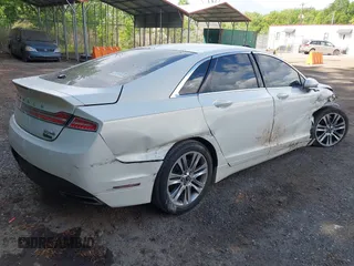 2013 Lincoln MKZ with VIN 3LN6L2J99DR807158, listed as a IAAI auction lot 42201507 with 139,766 mi miles and . Bid and sale history available at DreamBid. Image 4.
