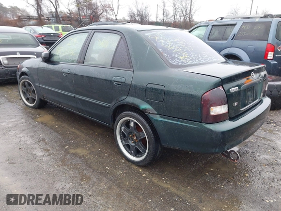 2000 Mazda Protege DX with VIN JM1BJ2225Y0255349, listed as a IAAI auction lot 41604895 with Not Provided miles and . Bid and sale history available at DreamBid. Image 3.