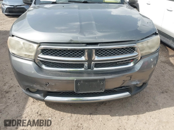 2012 Dodge Durango SXT with VIN 1C4RDHAG2CC257167, listed as a IAAI auction lot 42097986 with 202,875 mi miles and . Bid and sale history available at DreamBid. Image 6.