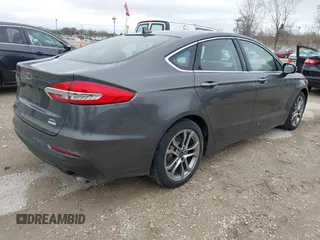 2019 Ford Fusion SEL with VIN 3FA6P0CDXKR129411, listed as a IAAI auction lot 42082323 with 126,048 mi miles and . Bid and sale history available at DreamBid. Image 4.