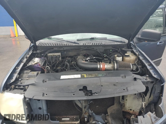 2004 Ford Expedition Special Service with VIN 1FMPU16L24LA74918, listed as a Copart auction lot 60278905 with 191,975 mi miles and Salvage title. Bid and sale history available at DreamBid. Image 12.