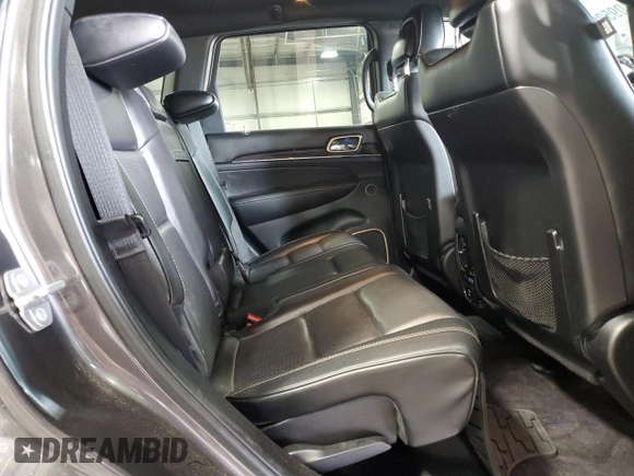2016 Jeep Grand Cherokee Overland with VIN 1C4RJFCG9GC345309, listed as a Copart auction lot 61095285 with 115,968 mi miles and Salvage title. Bid and sale history available at DreamBid. Image 11.