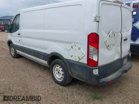 2015 Ford Transit Cargo z VIN 1FTNE1YM7FKB14241, wystawiony jako IAAI lot #42126200 z przebiegiem 314 744 mil mil oraz . Historia ofert i sprzedaży dostępna na DreamBid. Obrazek 3.