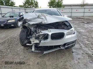 2014 BMW 5 Series 535i xDrive with VIN WBA5B3C5XED537318, listed as a Copart auction lot 55570655 with Not provided miles and Non repairable. Bid and sale history available at DreamBid. Image 5.