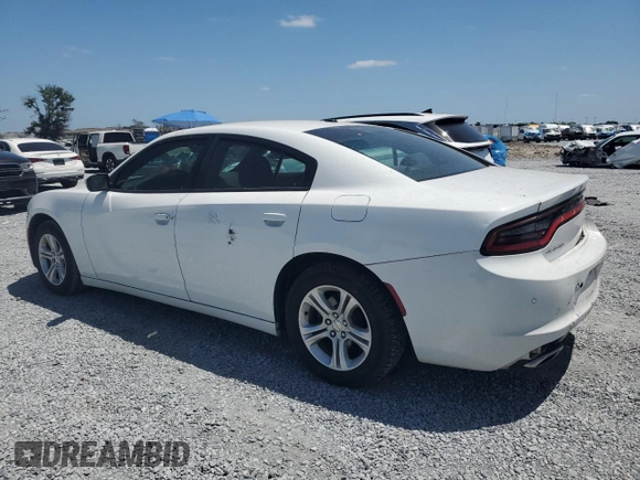 2019 Dodge Charger SXT with VIN 2C3CDXBG2KH664761, listed as a Copart auction lot 54741055 with 82,772 mi miles and Salvage Title. Bid and sale history available at DreamBid. Image 2.