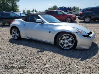 2012 Nissan 370Z Touring with VIN JN1AZ4FH3CM370910, listed as a Copart auction lot 65940005 with 23,009 mi miles and Salvage title. Bid and sale history available at DreamBid. Image 12.
